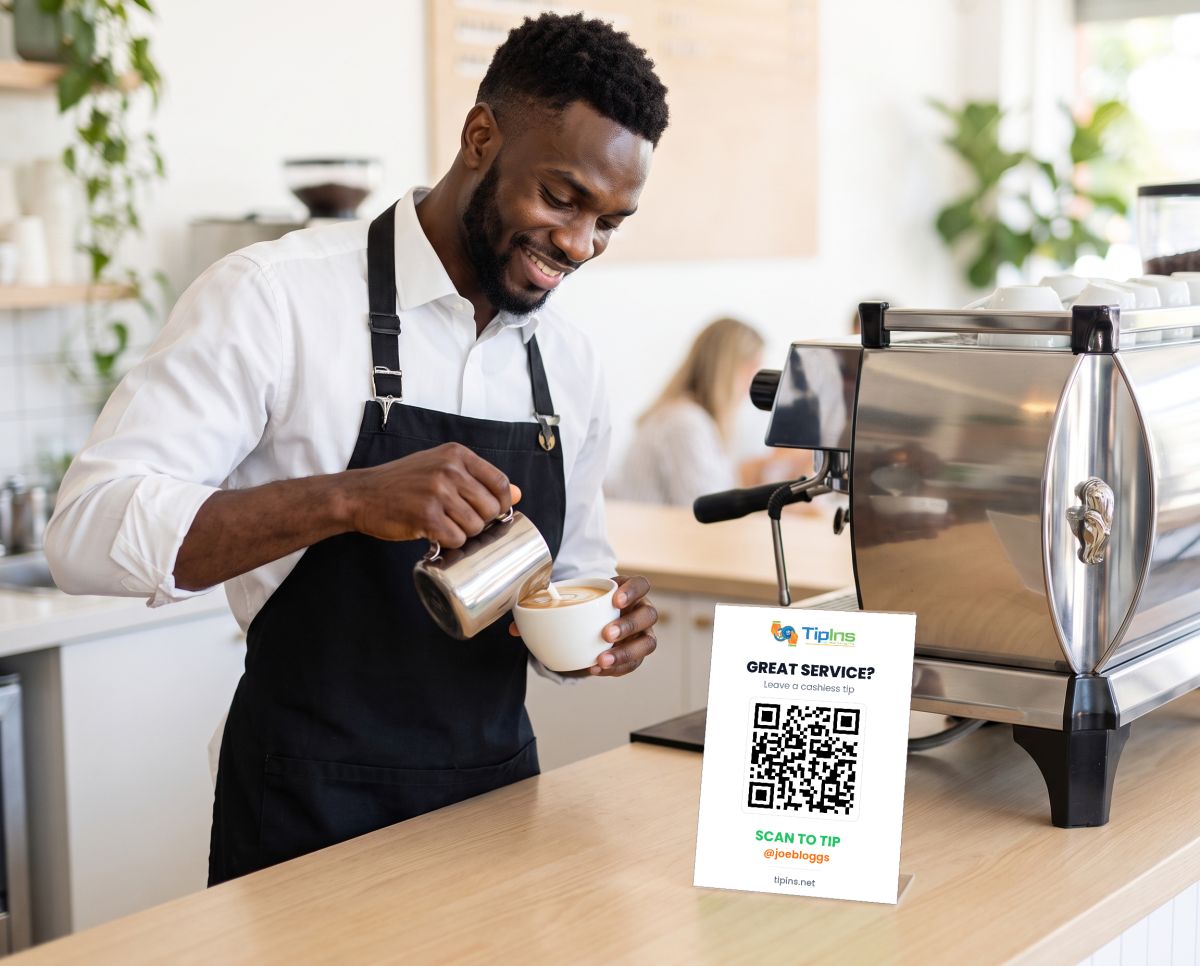 A barista pouring coffee beside a TipIns QR sign