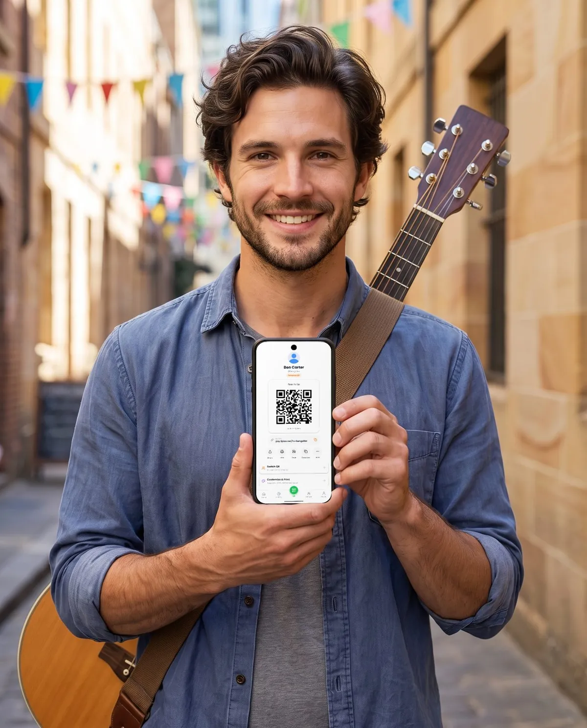 A street musician holding a phone that shows his QR code for tips